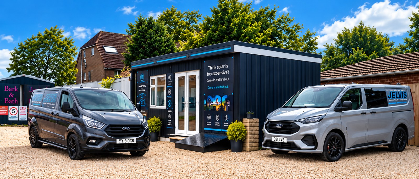 Jelvis branded showroom exterior with Ford vans